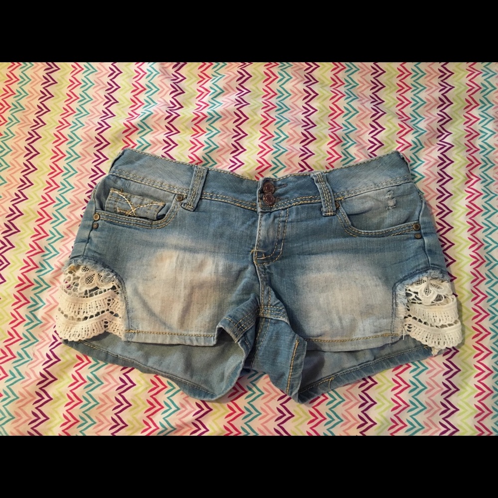 Denim shorts with crochet sides